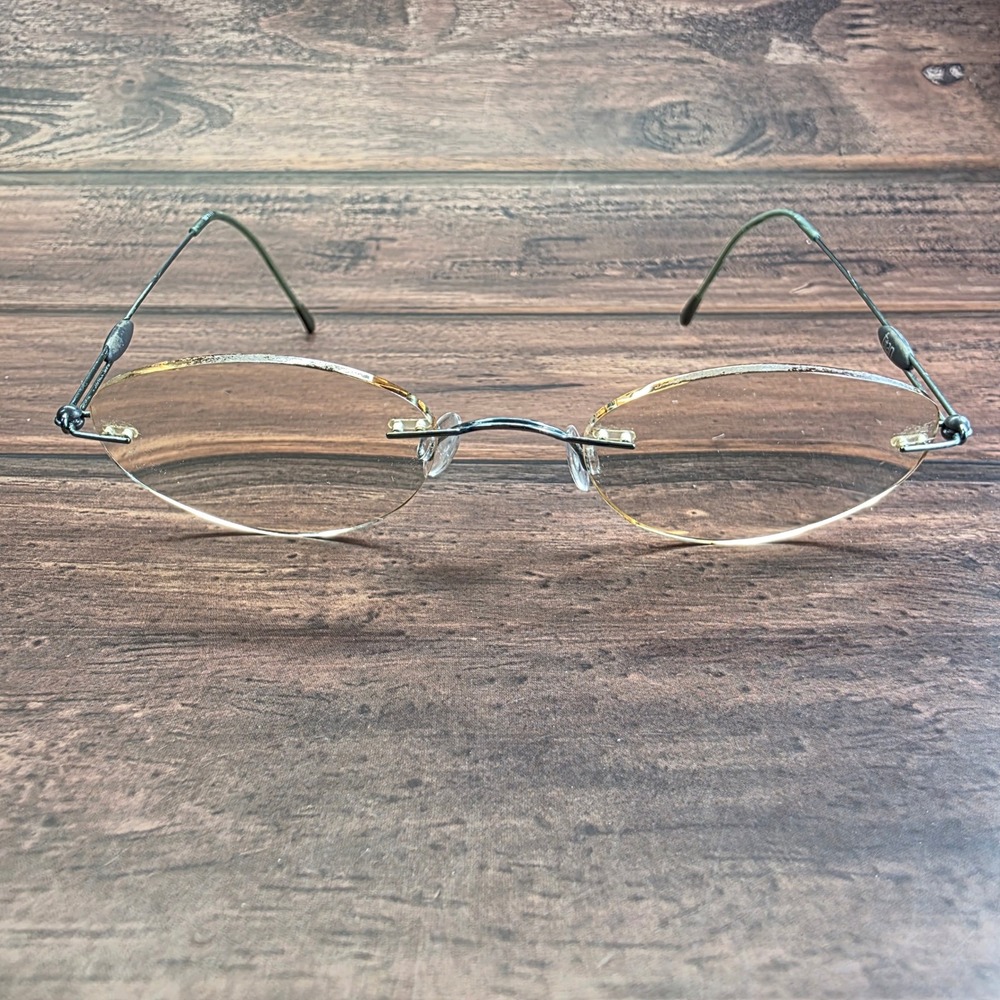 Silhouette Titan M7371 Rimless Eyeglasses Silver Green Oval Minimalist